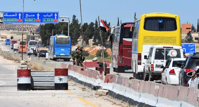 ميليشيات النظام تسرق السوريين - afp